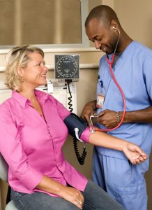 Woman at blood pressure examination Woman at blood pressure examination